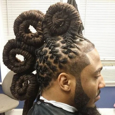 Original content — sculptural loc updo with circular details