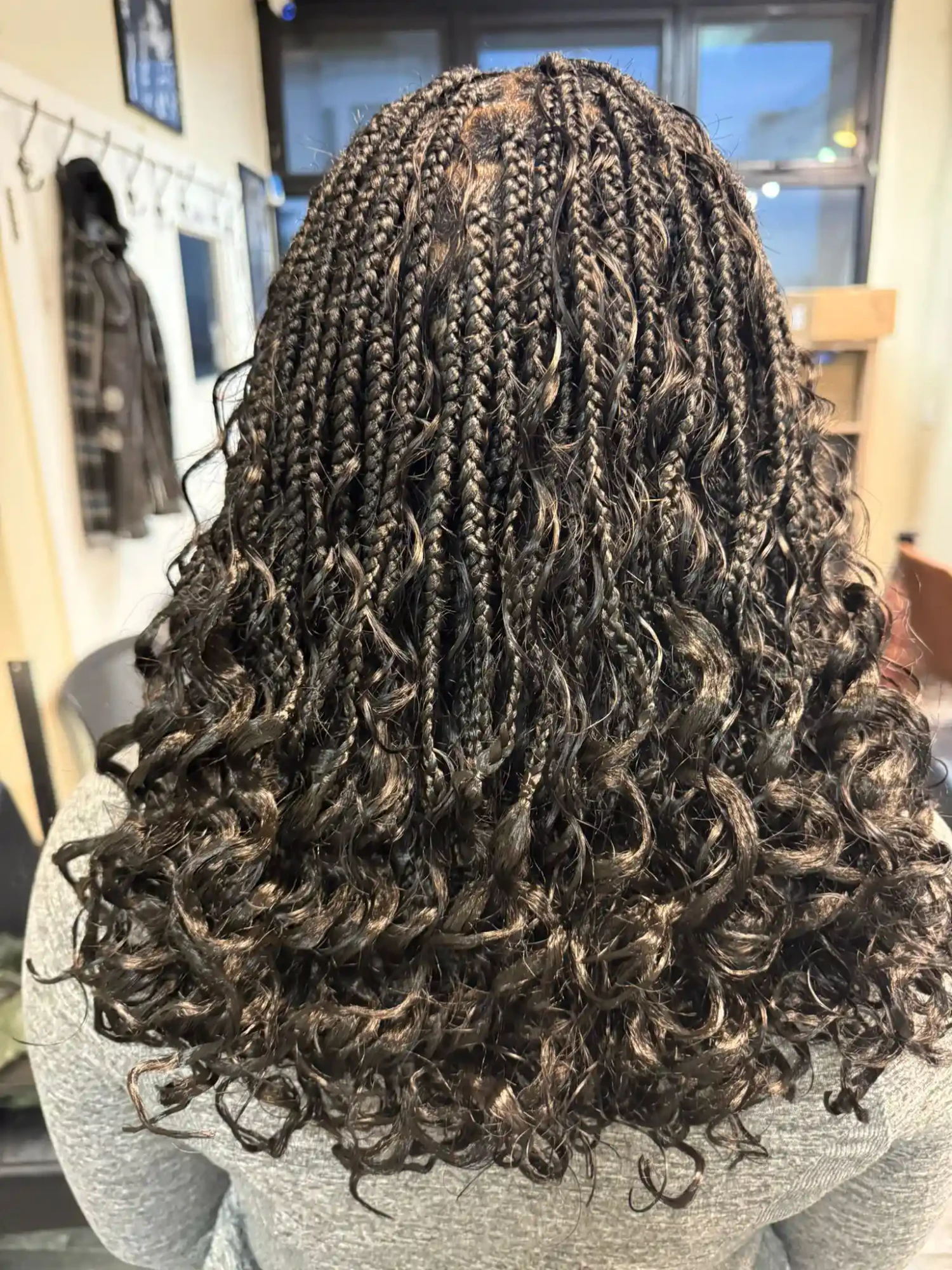 Original content — curly braided finish photographed from behind